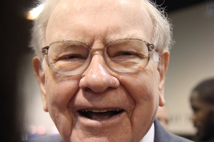 Warren Buffett smiling.