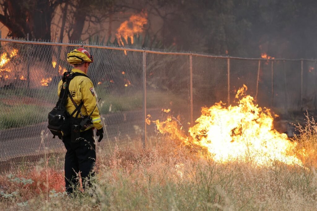 A Cal Fire crew works to extinguish the Thompson Fire on July 2 in Butte County, California. Credit: Cal Fire