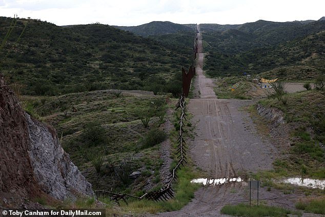 The massive hole in the border wall before the reservation can be seen across from the pre-set shelters