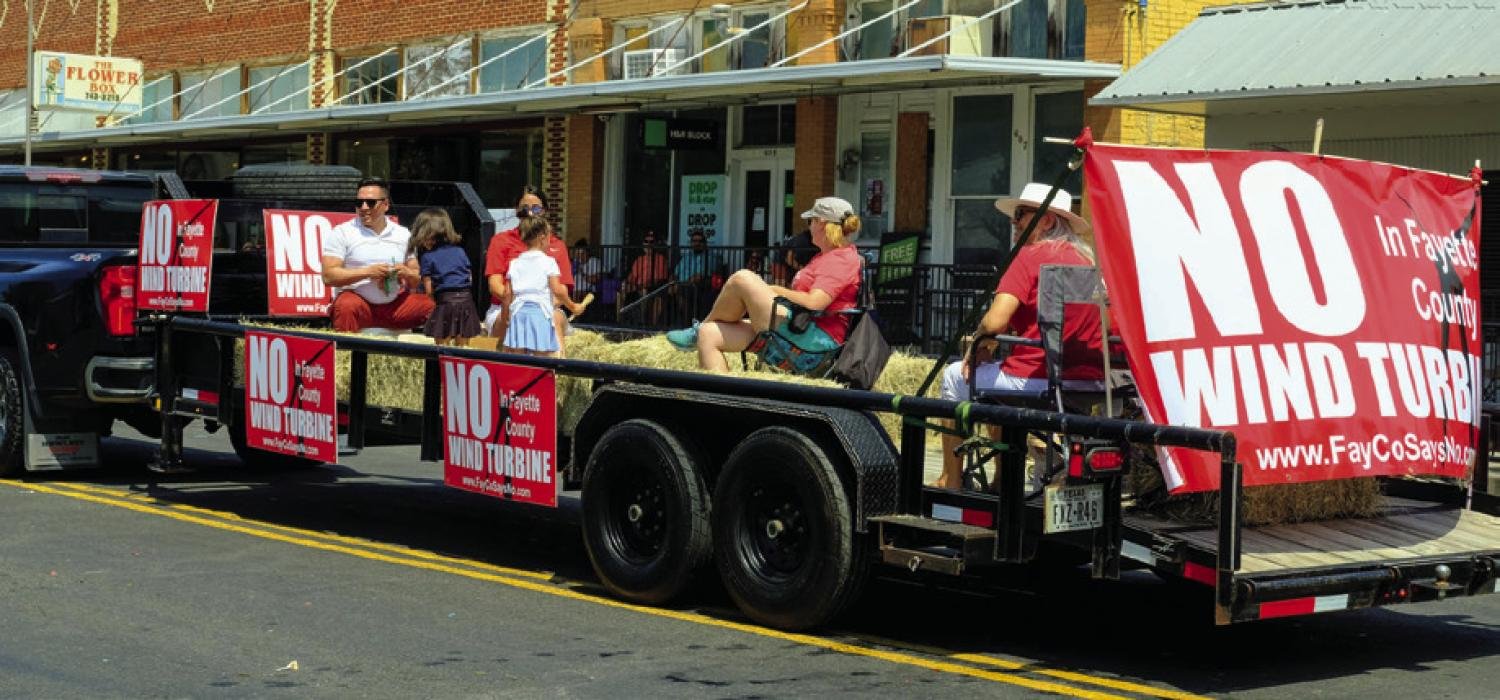 FayCoDaysNo, the group fighting green energy projects in Fayette County, had a float in the Schulenburg Festival Parade on Sunday. Photo by Andy Behlen