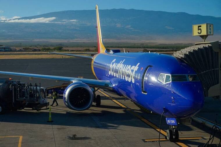 REUTERS/MIKE BLAKE / AUG. 16
                                A Southwest plane is shown at the gate at Kahului Airport in Kahului on Maui.