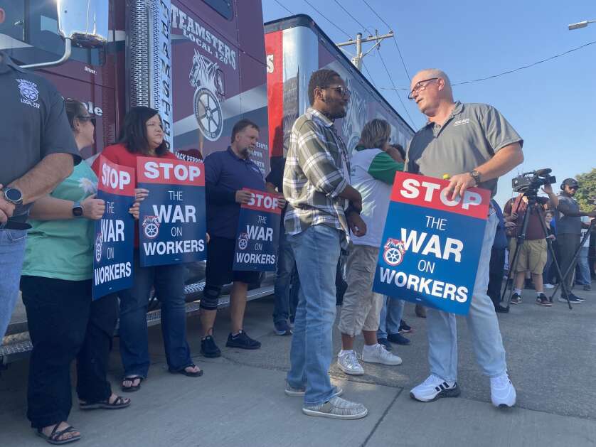  Union supporters listen to speakers Oct. 10 during a rally organized by Teamsters Local 238 in support of workers on strike at the Cargill corn milling facility in Cedar Rapids. (Tom Barton/The Gazette) 