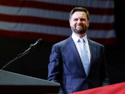 JD Vance Stands at a podium