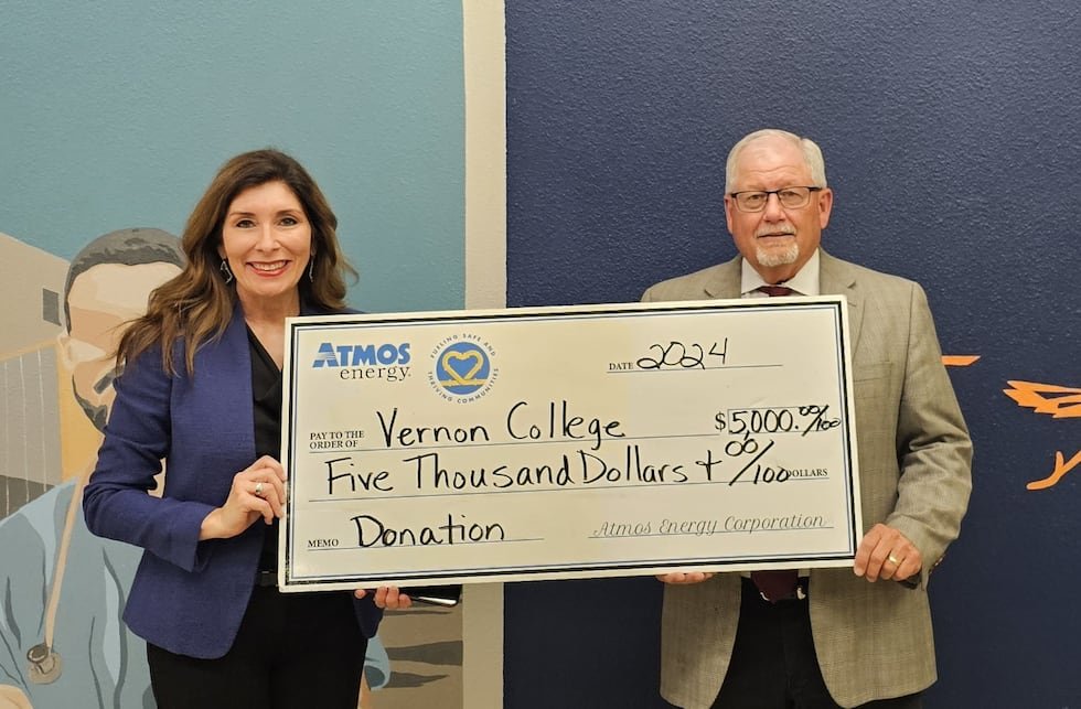 Atmos Energy Manager of Public Affairs Pam Hughes Pak and Vernon College President Dr. Dusty...