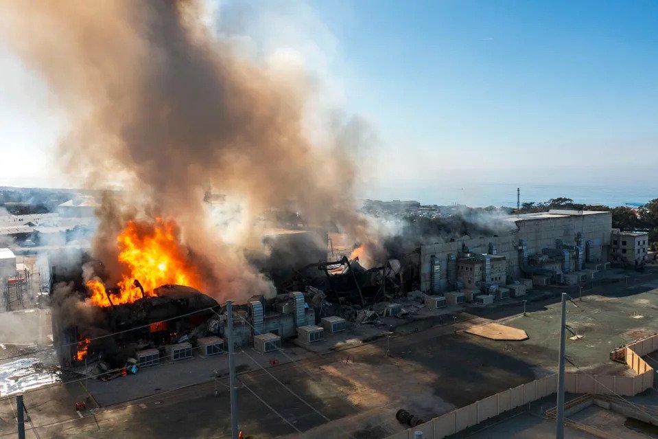 A fire burns at a battery storage facility
