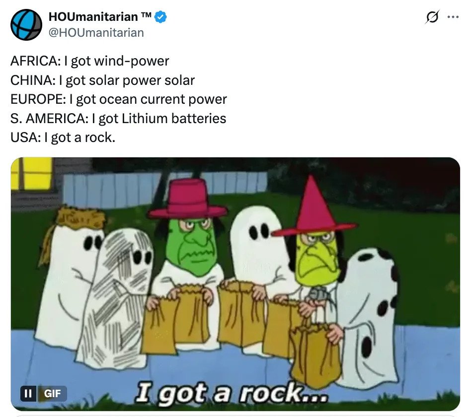 Cartoon: Various countries claim renewable energy sources. USA character, in ghost costume, holds a rock, referencing lack of progress