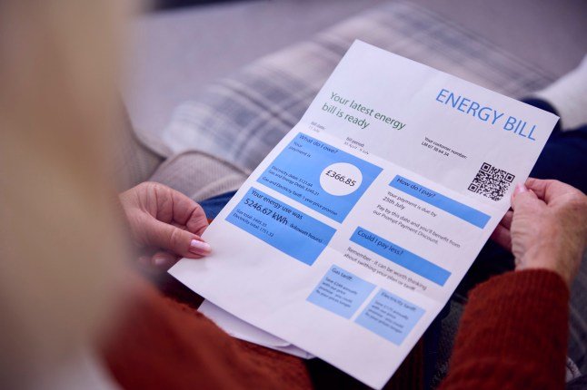 Person looking at a household energy bill.