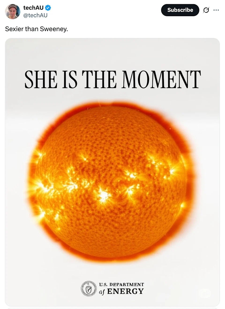 An image of the sun with the text "SHE IS THE MOMENT" and a U.S. Department of Energy logo below