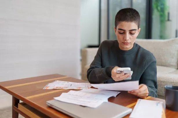 Woman checking her energy bills