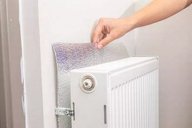 attaching foil to the back of the heater core