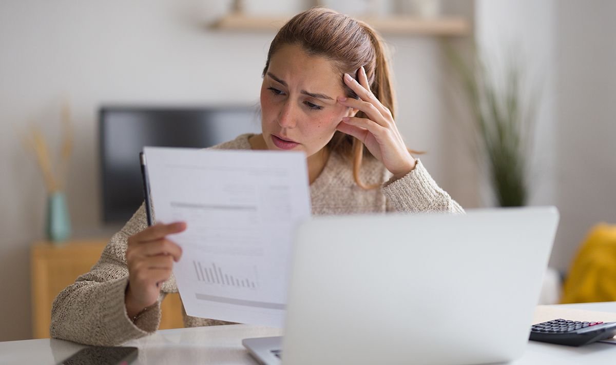 A woman checks her finances