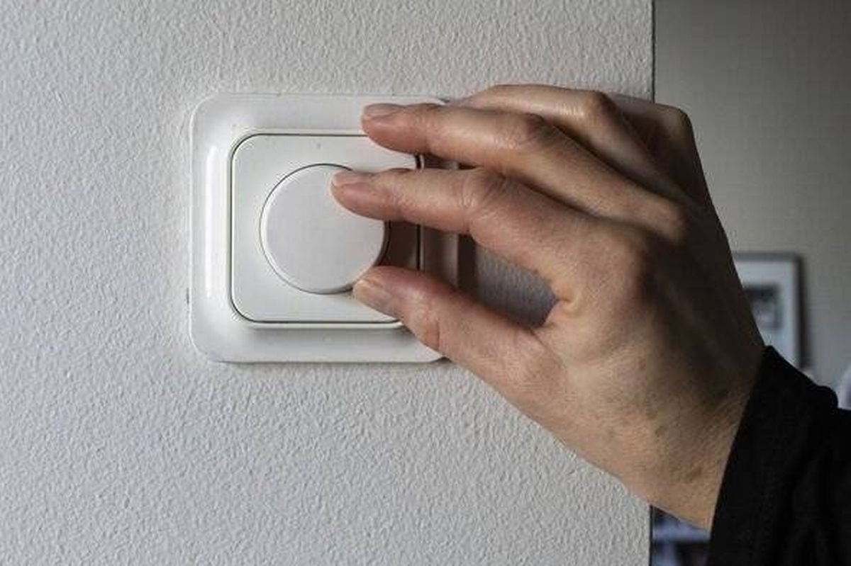 Hand on the dimmer