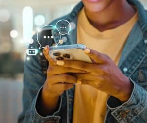 A person chatting using the mobile phone.