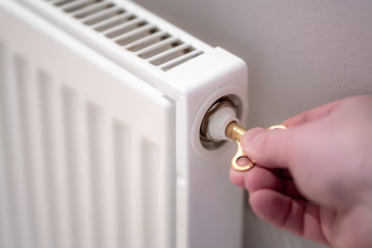 Bleeding a home radiator with a brass key