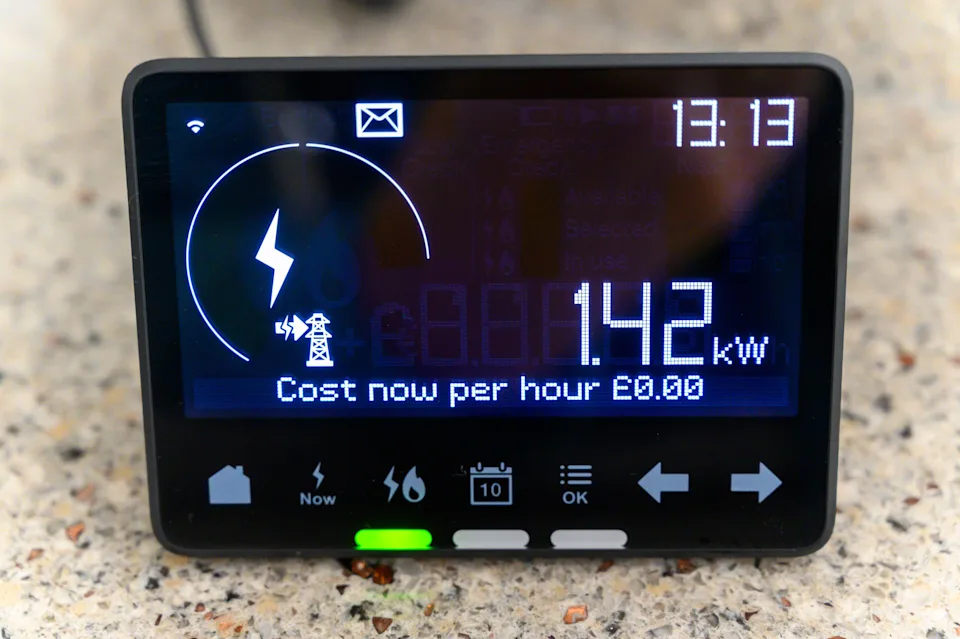 Closeup of domestic smart meter showing amount of electricity being exported back to the grid from installed solar panels. United Kingdom.