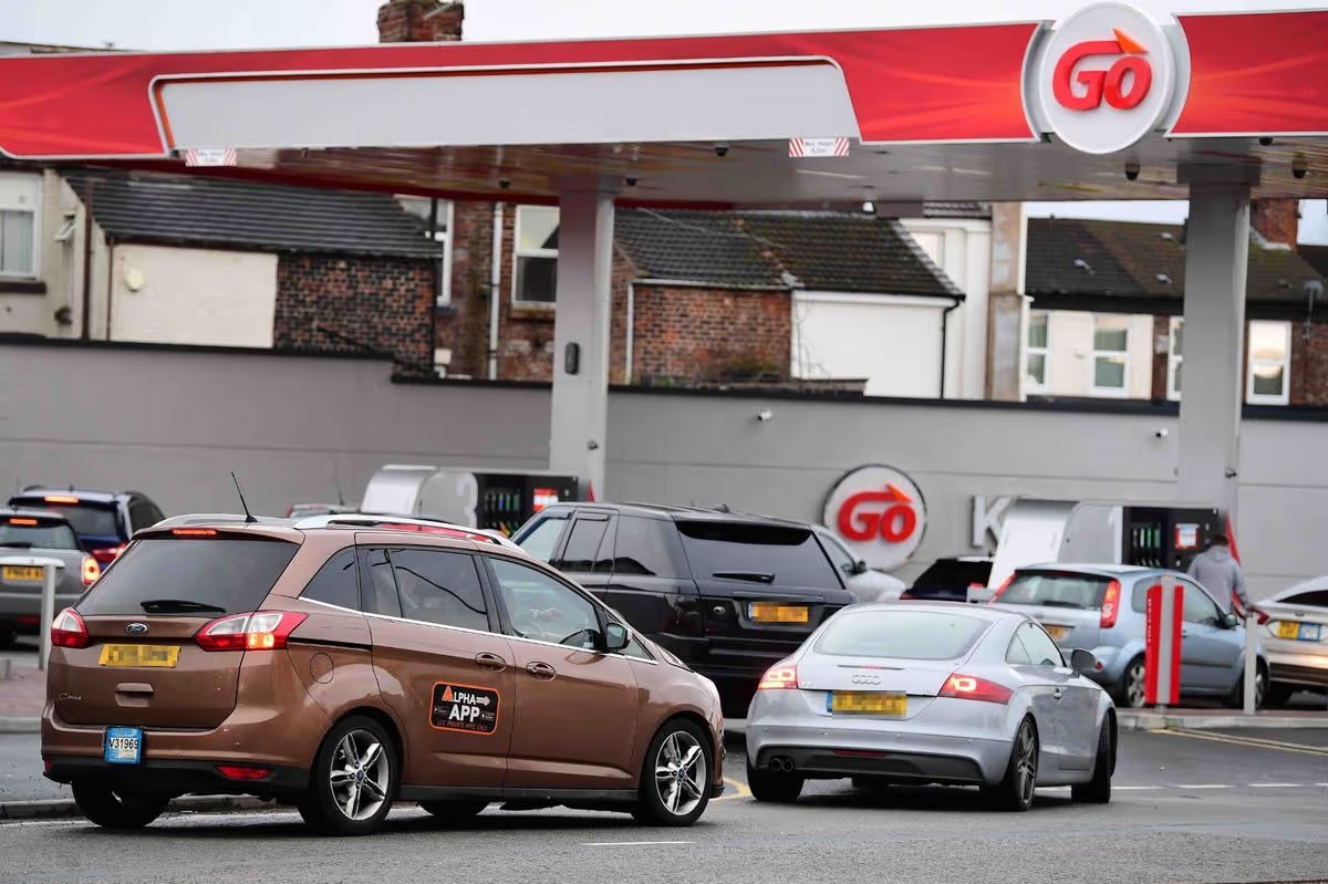 Motorists queue for fuel at the Go 24 Hour Express Petrol Station,Kirkdale
