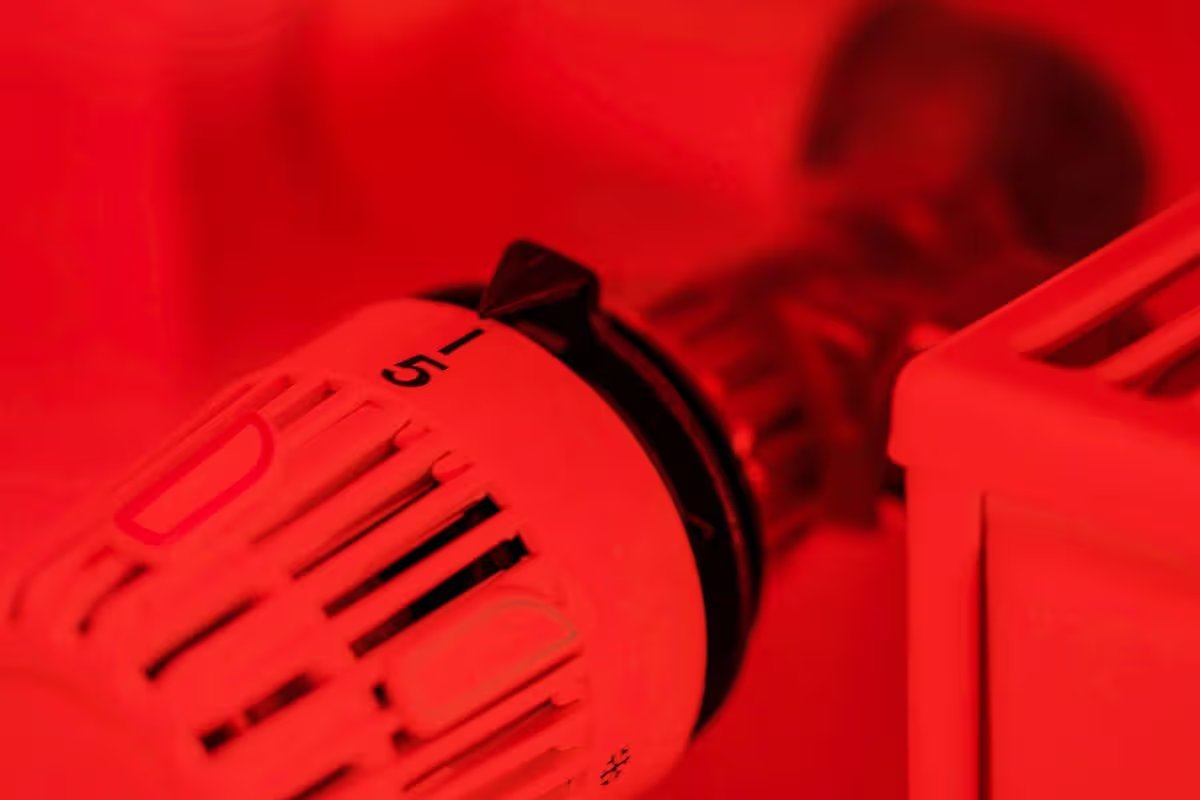 Modern thermostat on a heater at level 5 