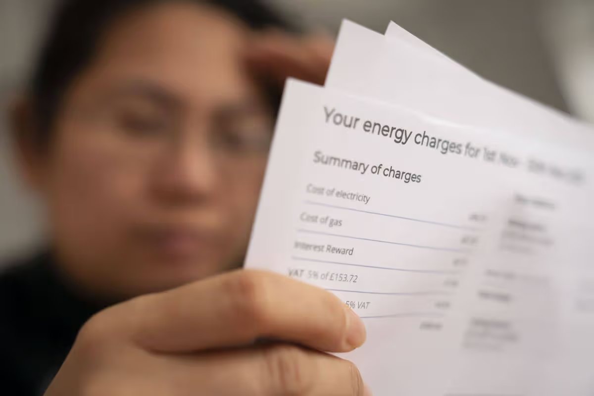 woman reading energy bill