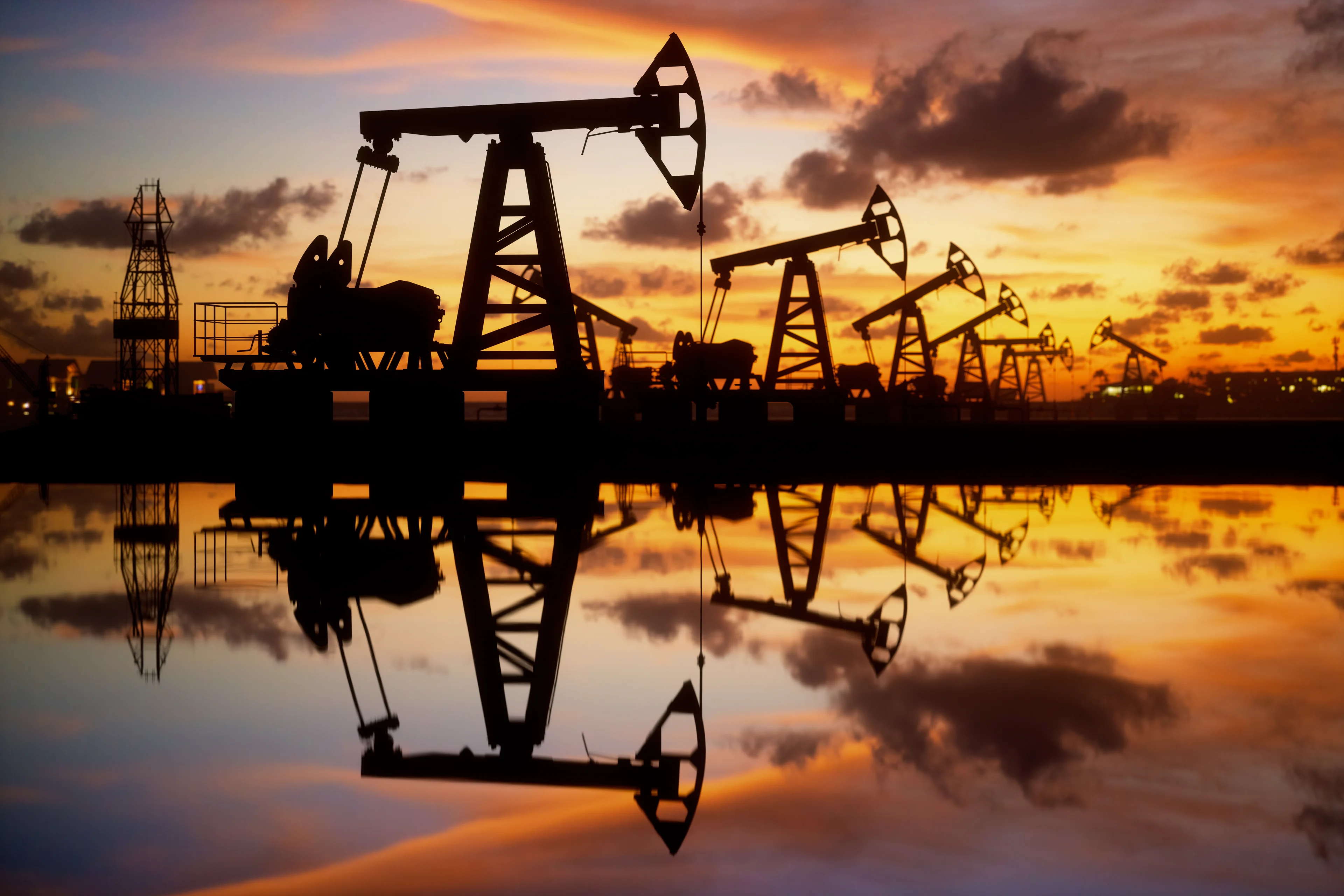 Oil rigs at dusk.