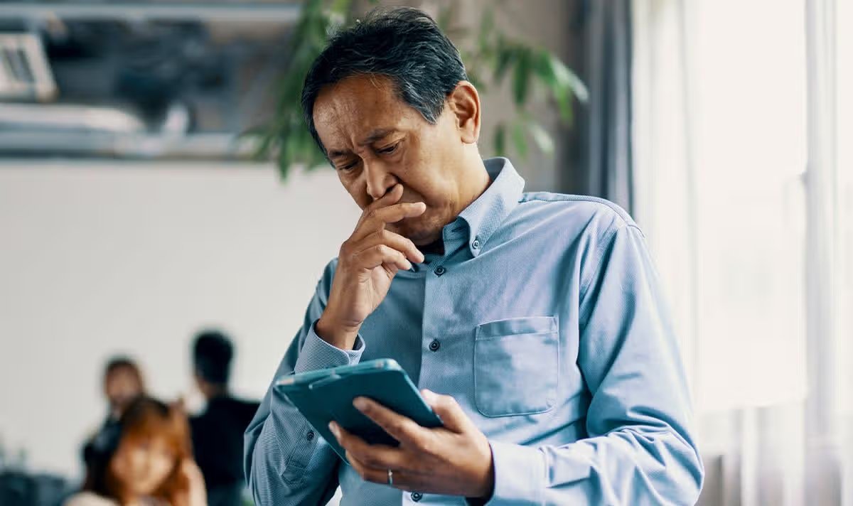 A man checks his finances